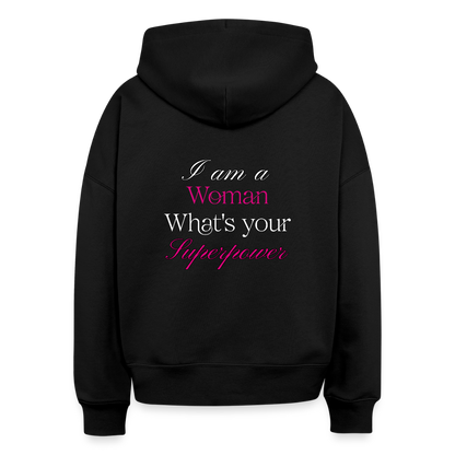 Frauen Power Hoodie – „I am a Woman, What’s your Superpower?“ aus Bio-Baumwolle - Schwarz